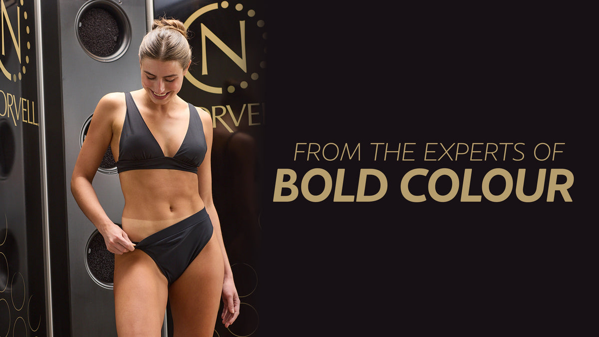 Norvell banner featuring a woman in a black bikini beside gold text reading “From the experts of bold color.”