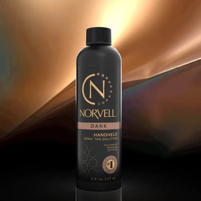 Norvell Dark handheld spray tan solution bottle.