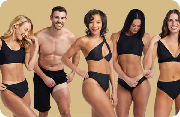 Group of diverse models displaying results from Dallas spray tan training